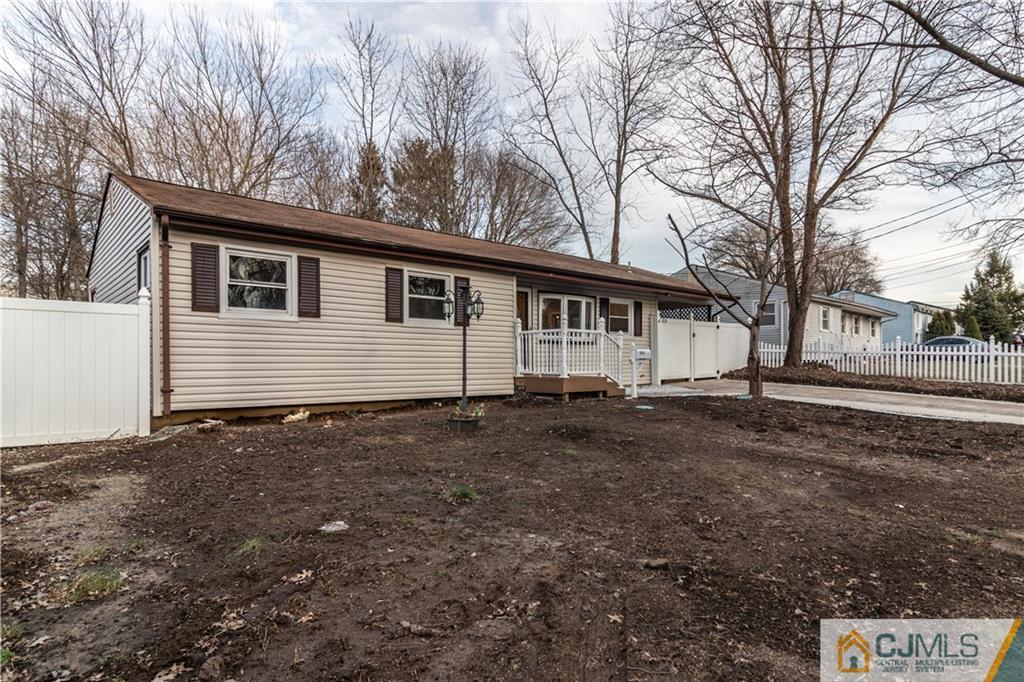 3034 Cheesequake Road Old Bridge, NJ 08859 - Photo 22 of 28 a view of a house with a yard