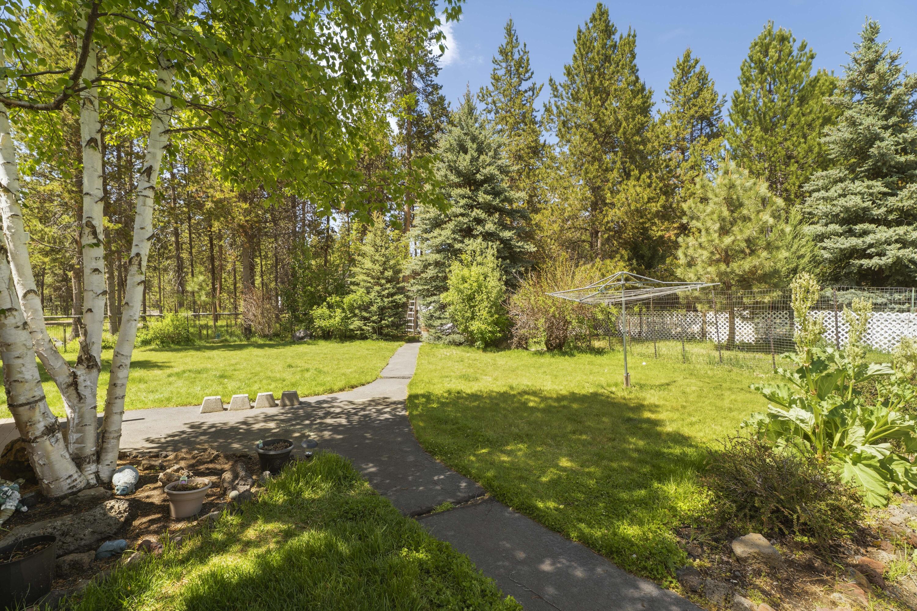 55885 Osprey Road Bend, OR 97707 - Photo 37 of 58 Yard with walking path throughout