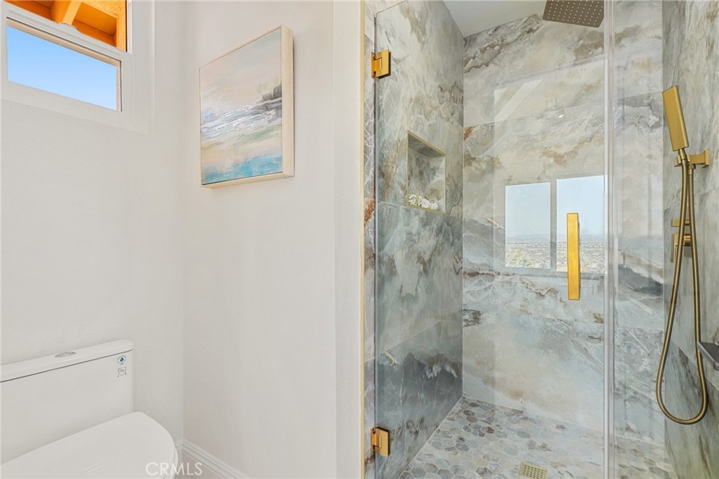 30352 Anamonte Laguna Niguel, CA 92677 - Photo 28 of 43 a bathroom with a shower and toilet