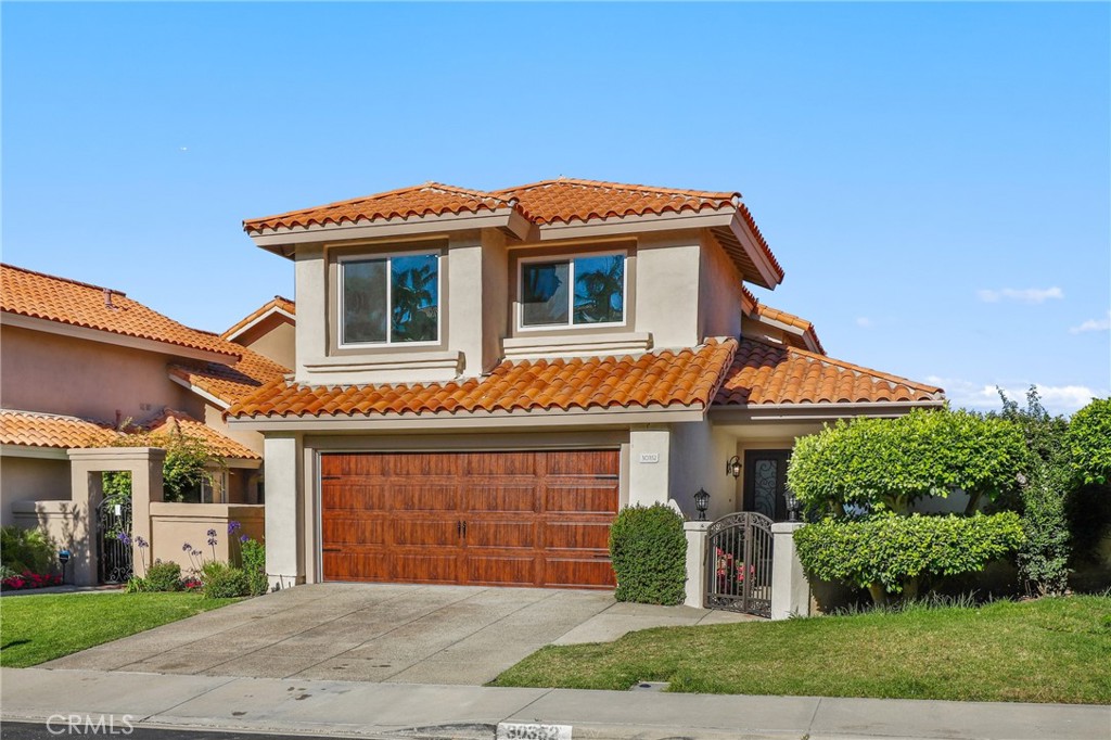 30352 Anamonte Laguna Niguel, CA 92677 - Photo 36 of 43 a front view of a house with a yard