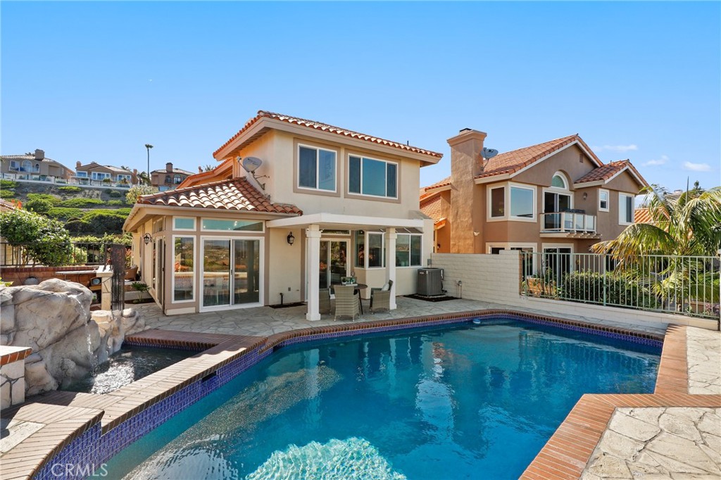 30352 Anamonte Laguna Niguel, CA 92677 - Photo 37 of 43 a front view of a house with swimming pool