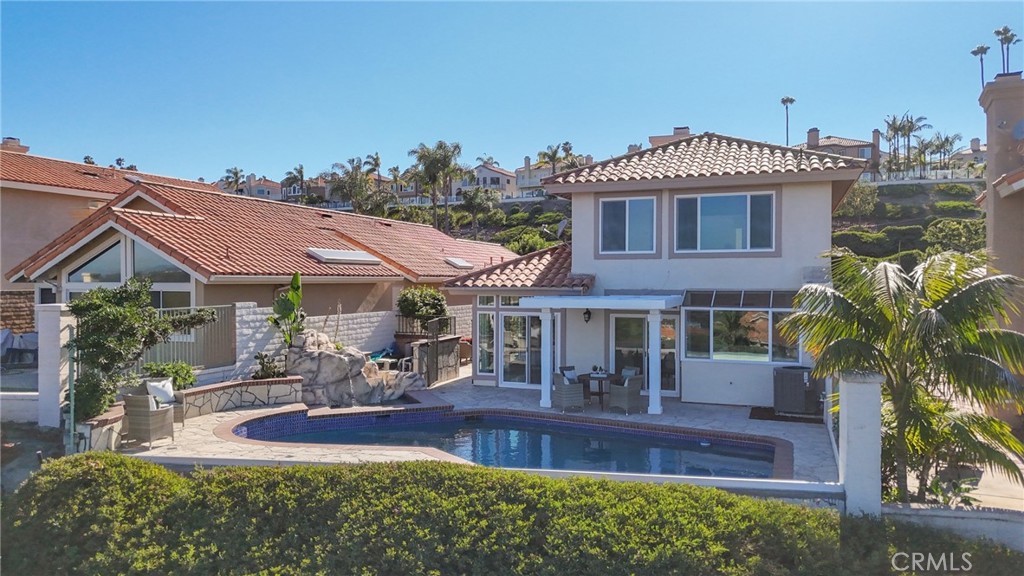 30352 Anamonte Laguna Niguel, CA 92677 - Photo 40 of 43 a front view of a house with garden