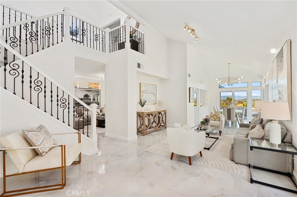 30352 Anamonte Laguna Niguel, CA 92677 - Photo 5 of 43 a view of a livingroom with furniture and windows