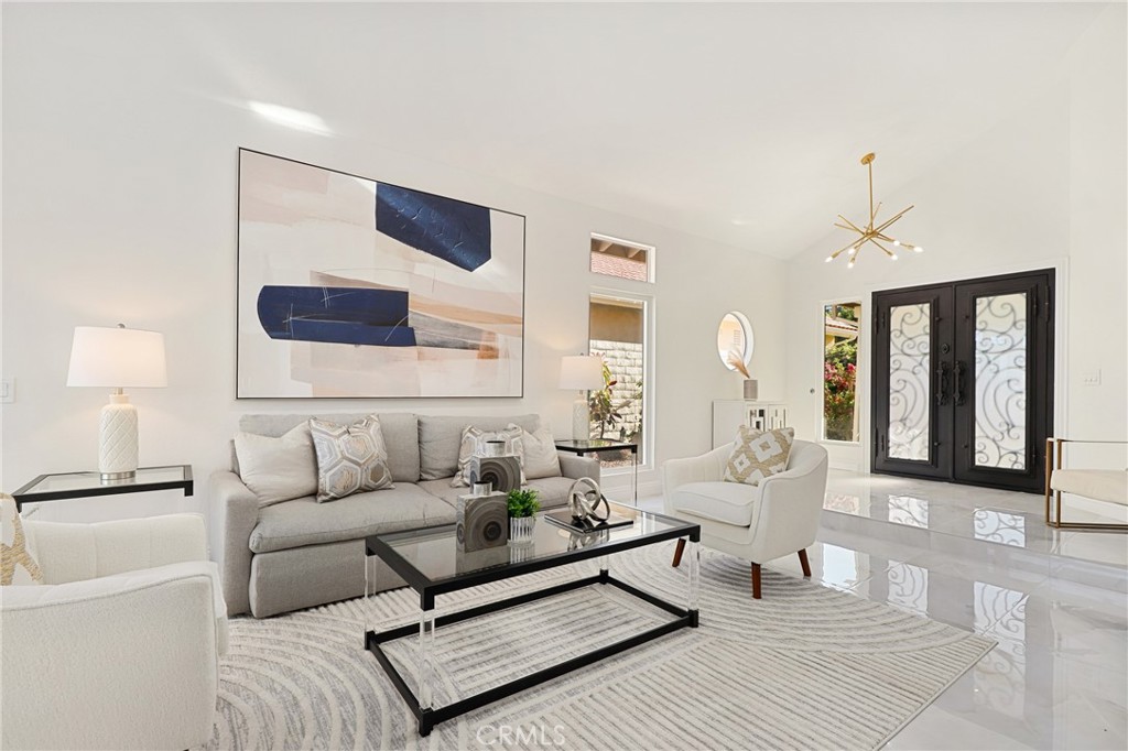 30352 Anamonte Laguna Niguel, CA 92677 - Photo 8 of 43 a living room with furniture and a flat screen tv