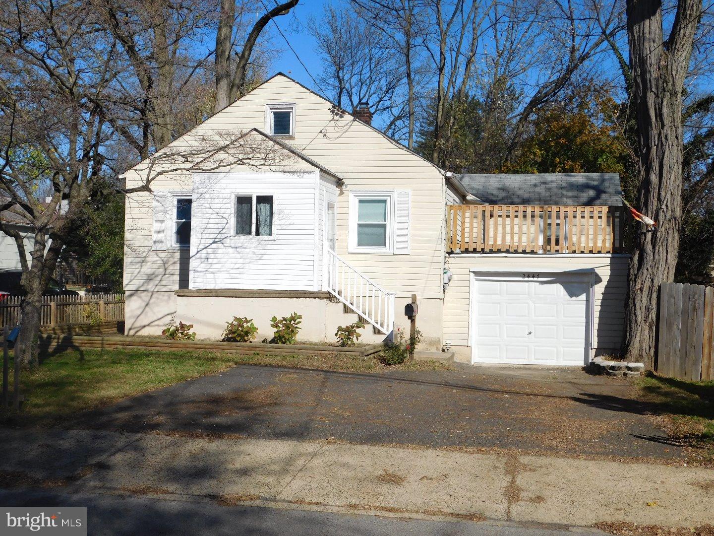 2447 Woodland Road Abington, PA 19001 - Photo 1 of 24 a front view of a house with a yard
