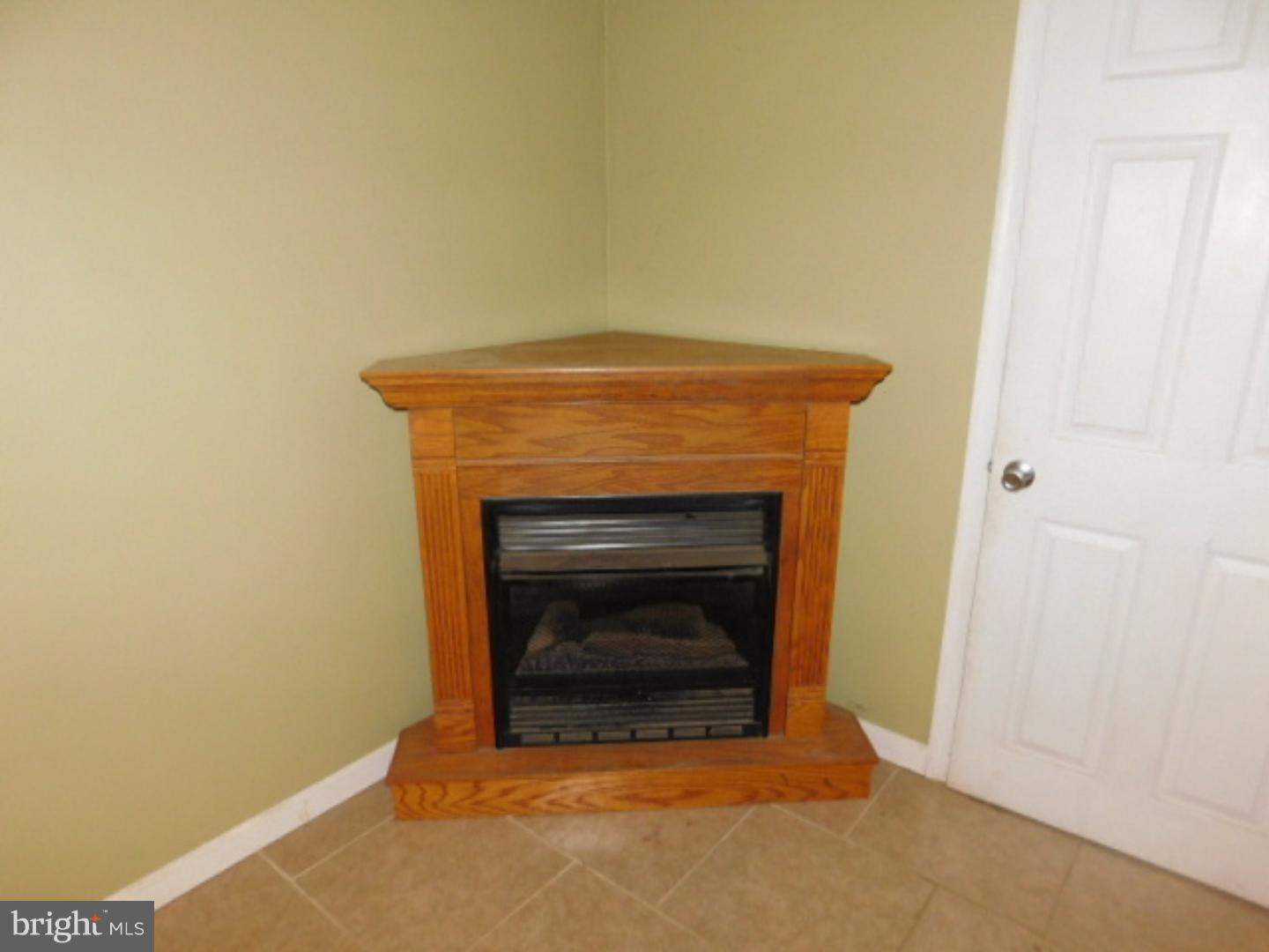 2447 Woodland Road Abington, PA 19001 - Photo 14 of 24 a living room with a fireplace