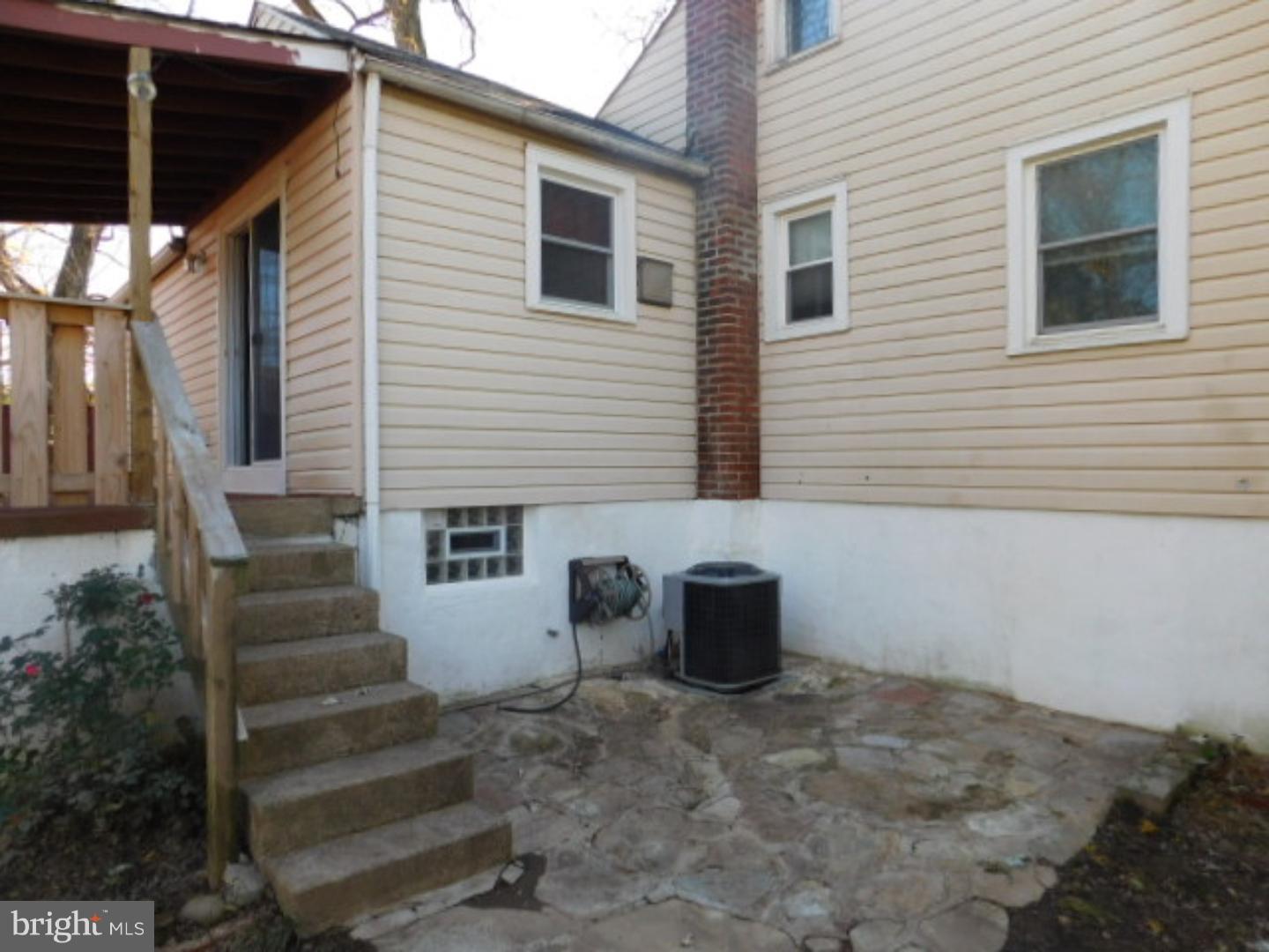 2447 Woodland Road Abington, PA 19001 - Photo 16 of 24 a view of a house with backyard and couches