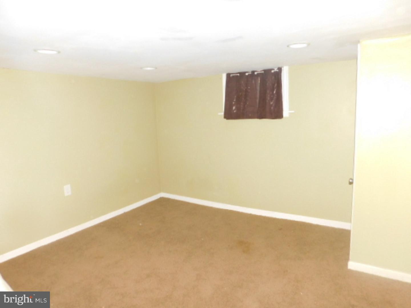 2447 Woodland Road Abington, PA 19001 - Photo 7 of 24 a view of a wall with a large window