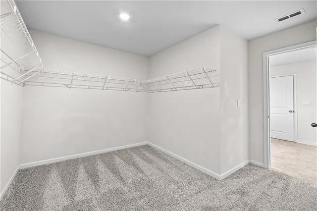 a view of a room with racks on the wall