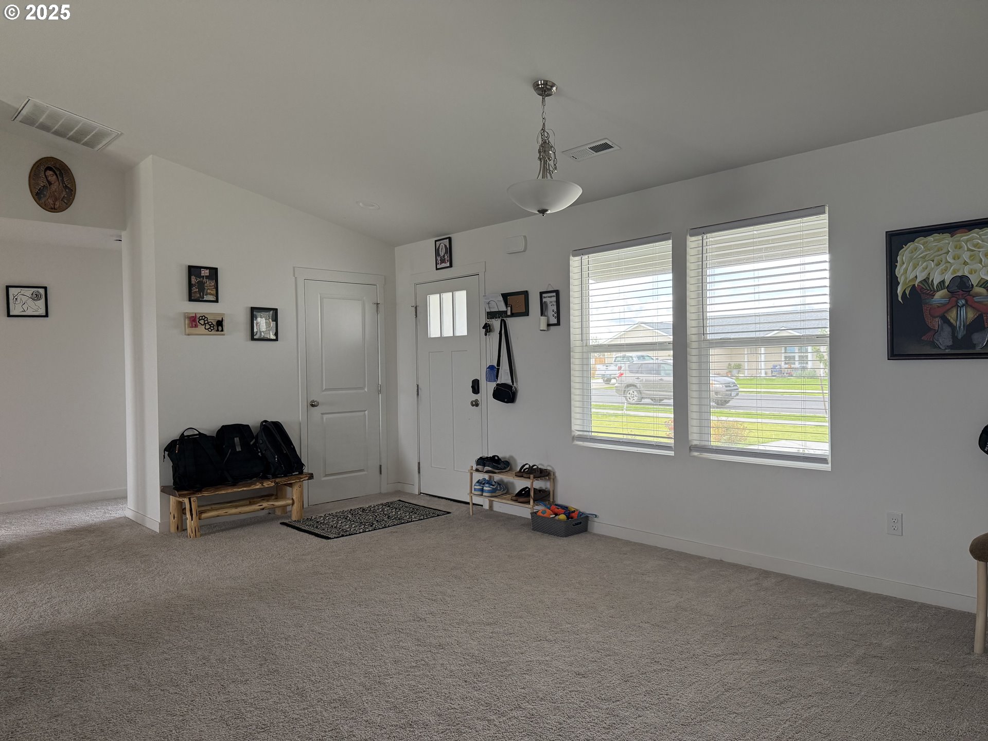 213 River Ridge Drive Boardman, OR 97818 - Photo 7 of 17 a room with gym equipment and a window