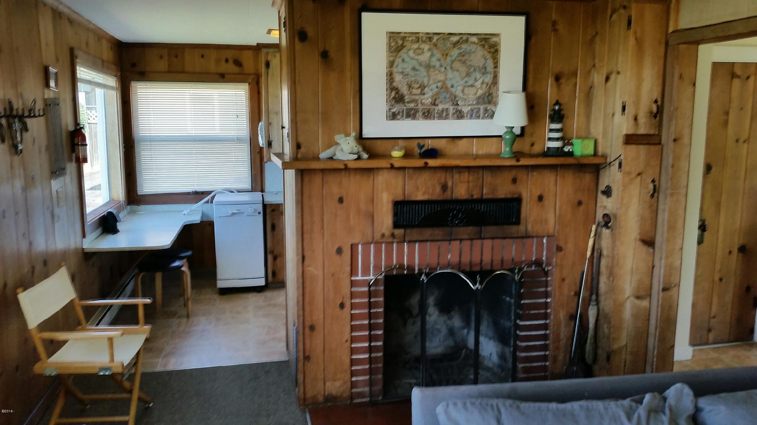 6225 Logan Road Lincoln City, OR 97367 - Photo 6 of 17 Wood burning Fireplace