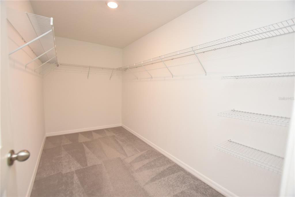 5643 Keaton Springs Drive Lakeland, FL 33811 - Photo 20 of 39 a view of a room with racks on the wall