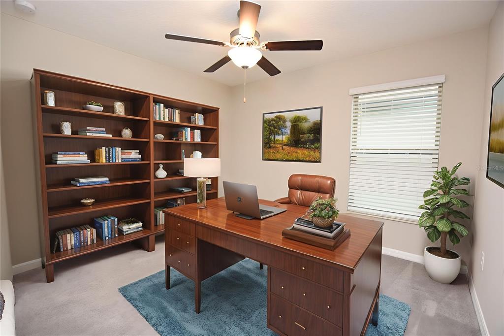 5643 Keaton Springs Drive Lakeland, FL 33811 - Photo 22 of 39 a workspace with furniture and a potted plant