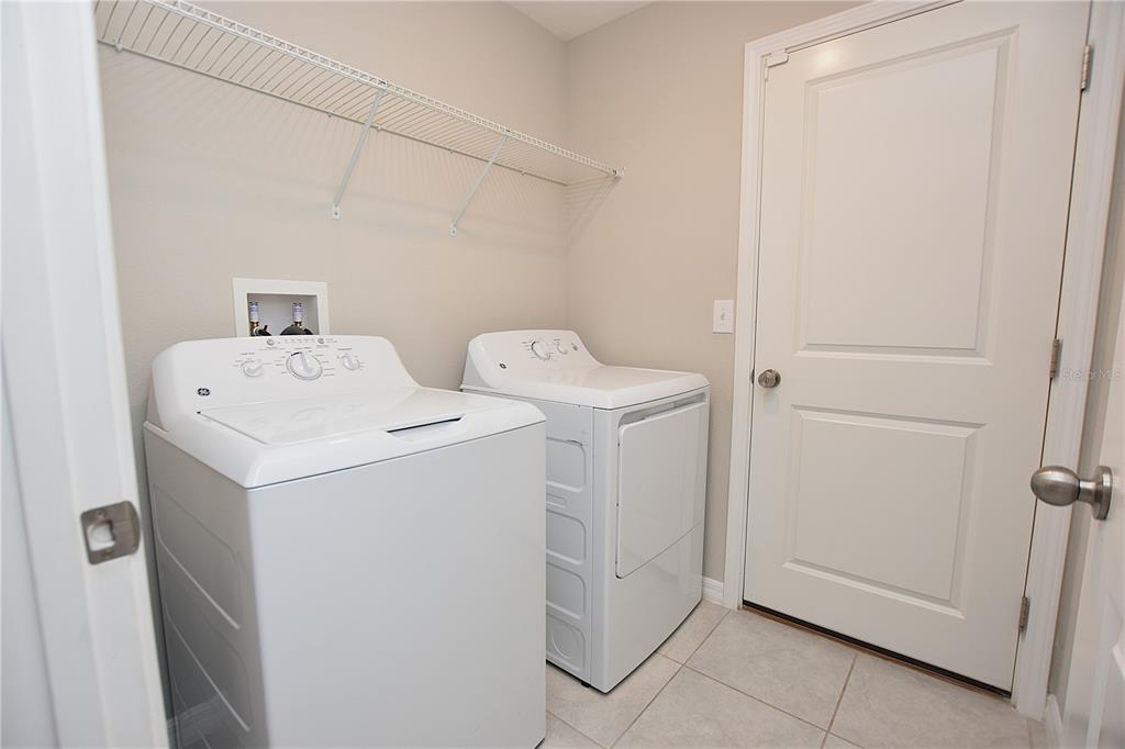 5643 Keaton Springs Drive Lakeland, FL 33811 - Photo 31 of 39 a utility room with dryer and washer