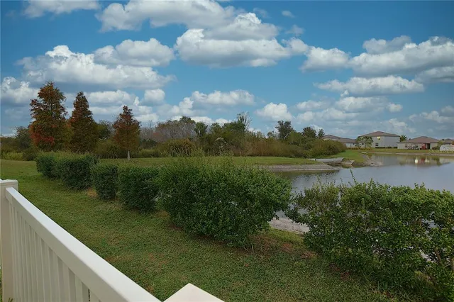 a view of a lake from a yard