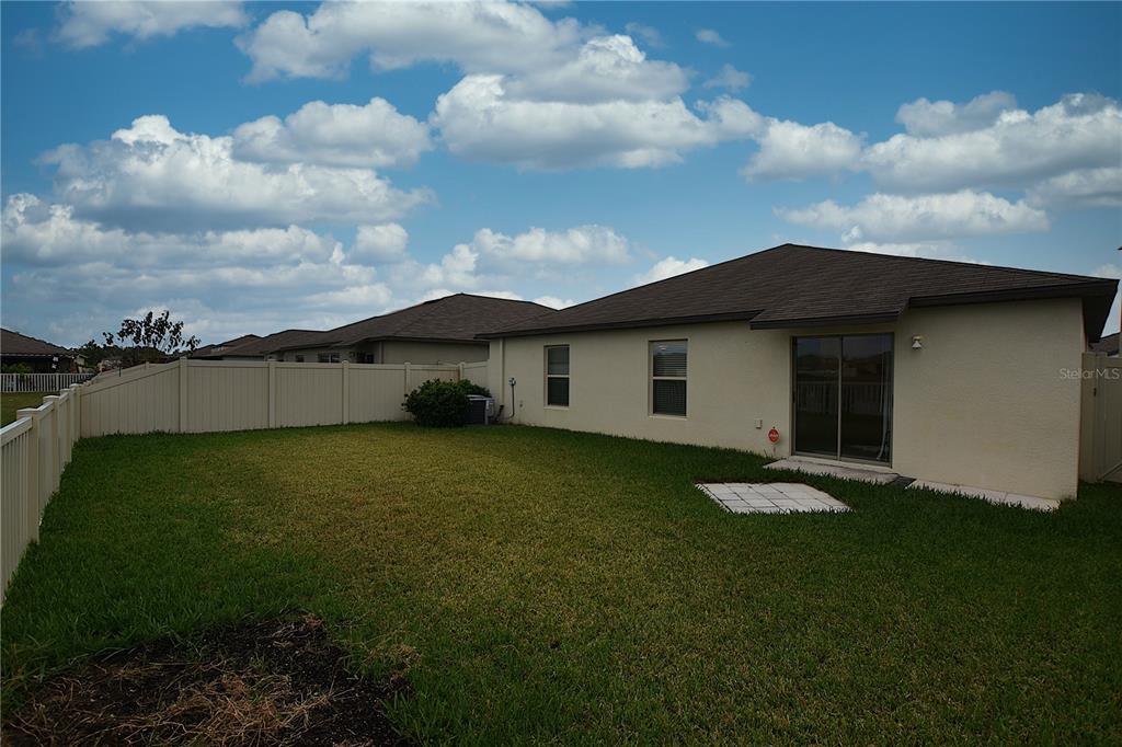 5643 Keaton Springs Drive Lakeland, FL 33811 - Photo 35 of 39 a view of a house with a garden