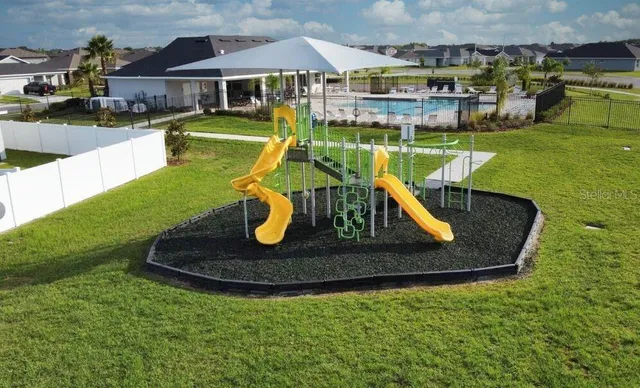 a view of a house with a swimming pool