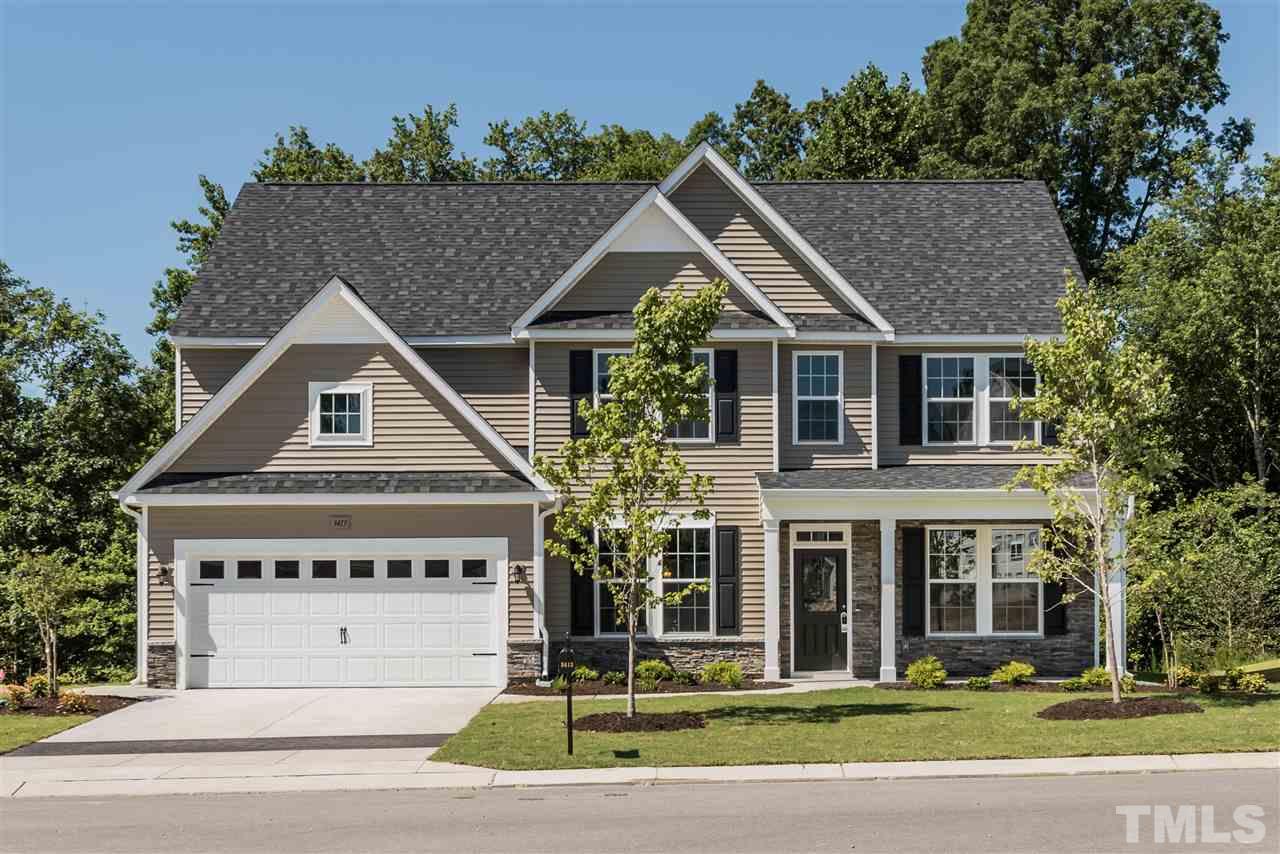 3413 Grosbeak Way Raleigh, NC 27616 - Photo 1 of 25 a front view of a house with a yard