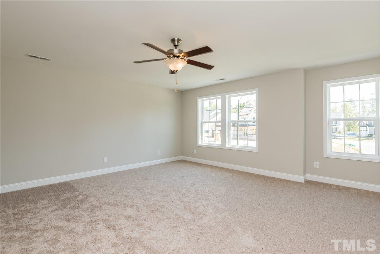 3413 Grosbeak Way Raleigh, NC 27616 - Photo 22 of 25 a view of an empty room with a window