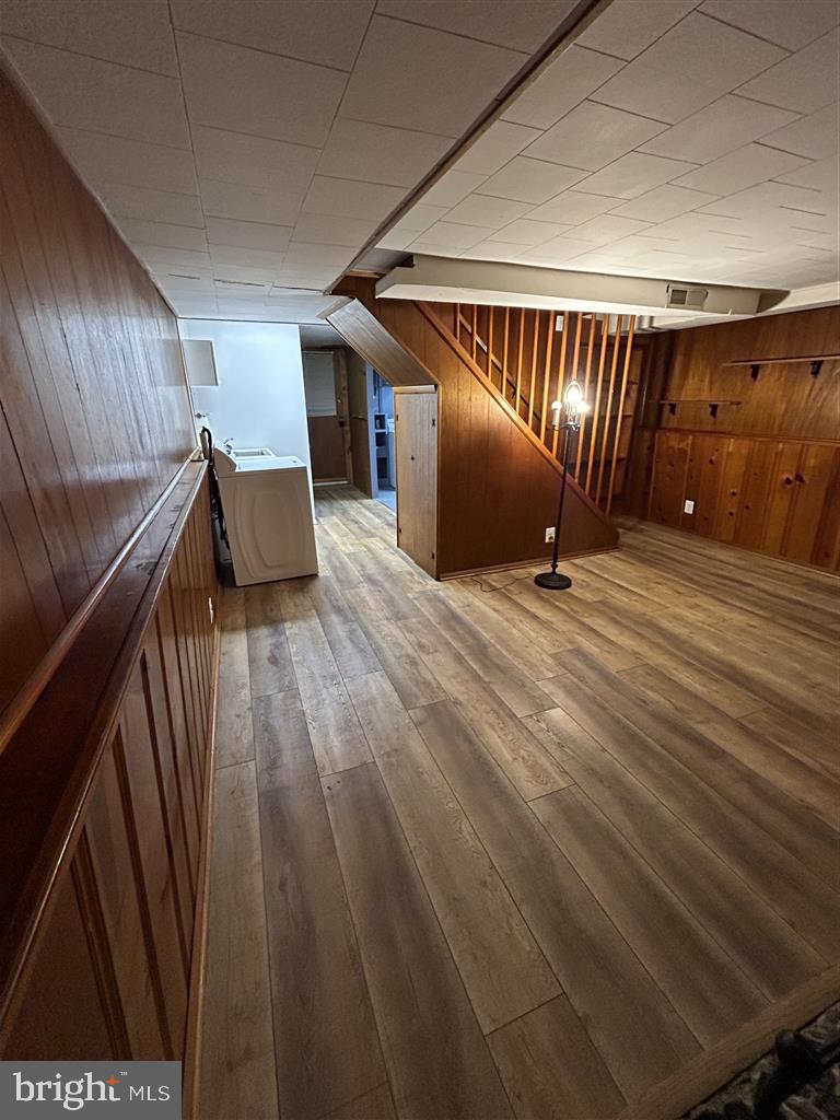 8333 Kavanagh Road Baltimore, MD 21222 - Photo 20 of 30 a view of an empty room with wooden floor