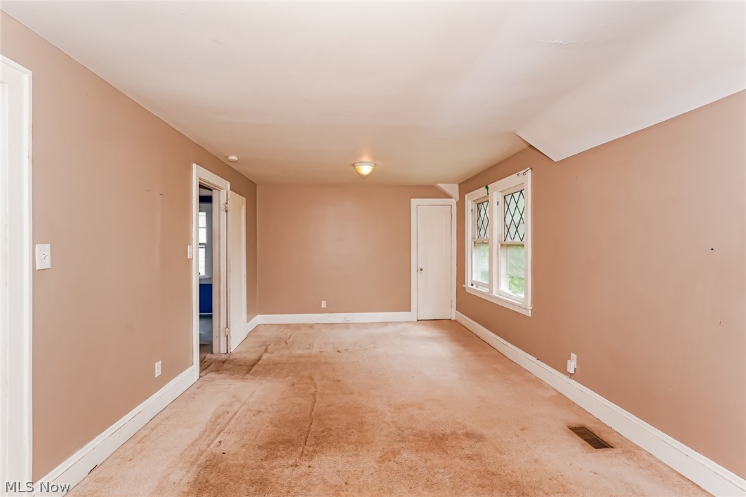 4586 Turney Road Cleveland, OH 44105 - Photo 11 of 16 Unfurnished room with light colored carpet