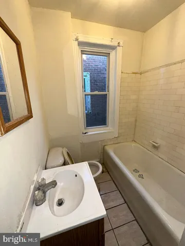 a bathroom with a sink and a bathtub