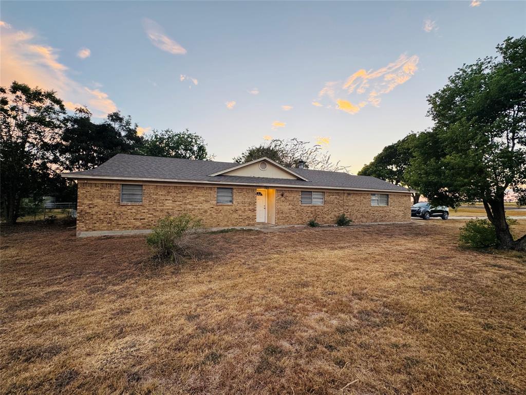 721 Mackey Ranch Road Bruceville-Eddy, TX 76524 - Photo 30 of 33 Brick exterior with a gabled roofline