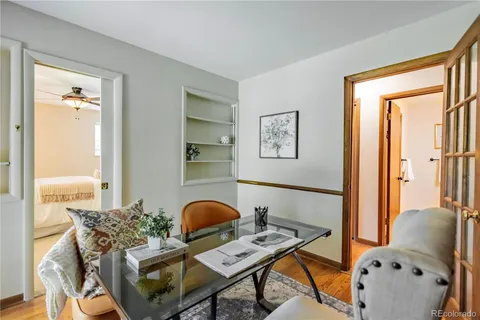 a living room with furniture and window