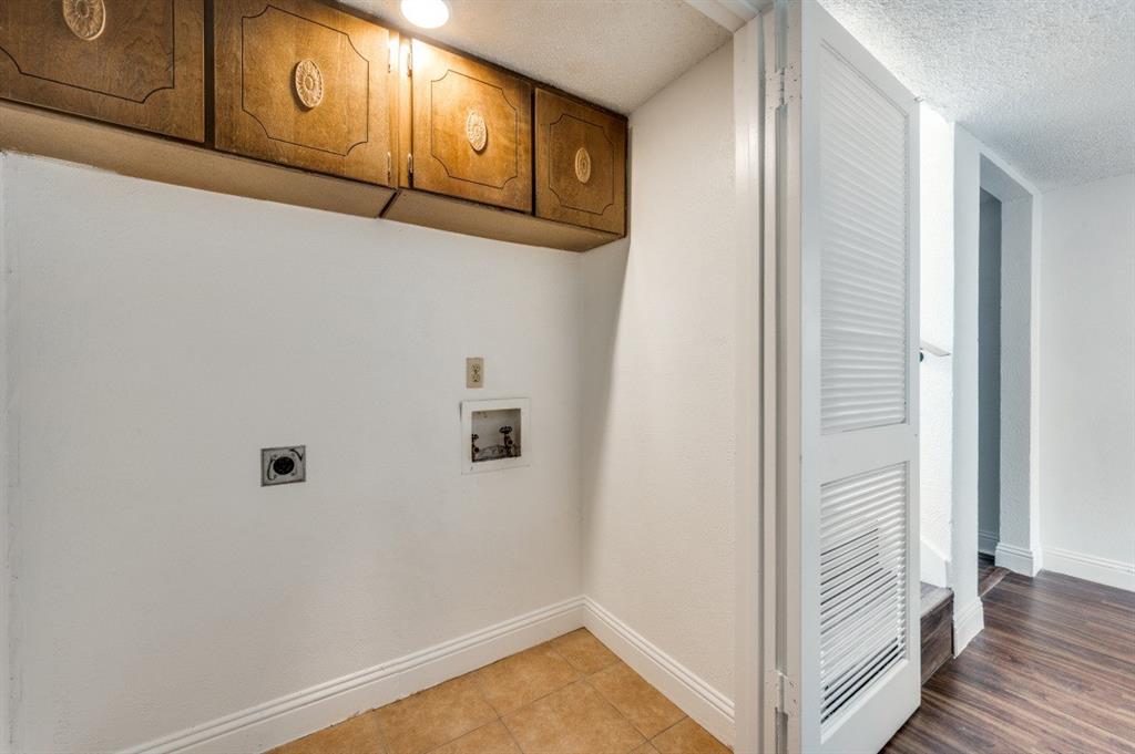 3001 Helmet Street, Unit 3003 Irving, TX 75060 - Photo 10 of 12 a view of a closet area with wooden floor