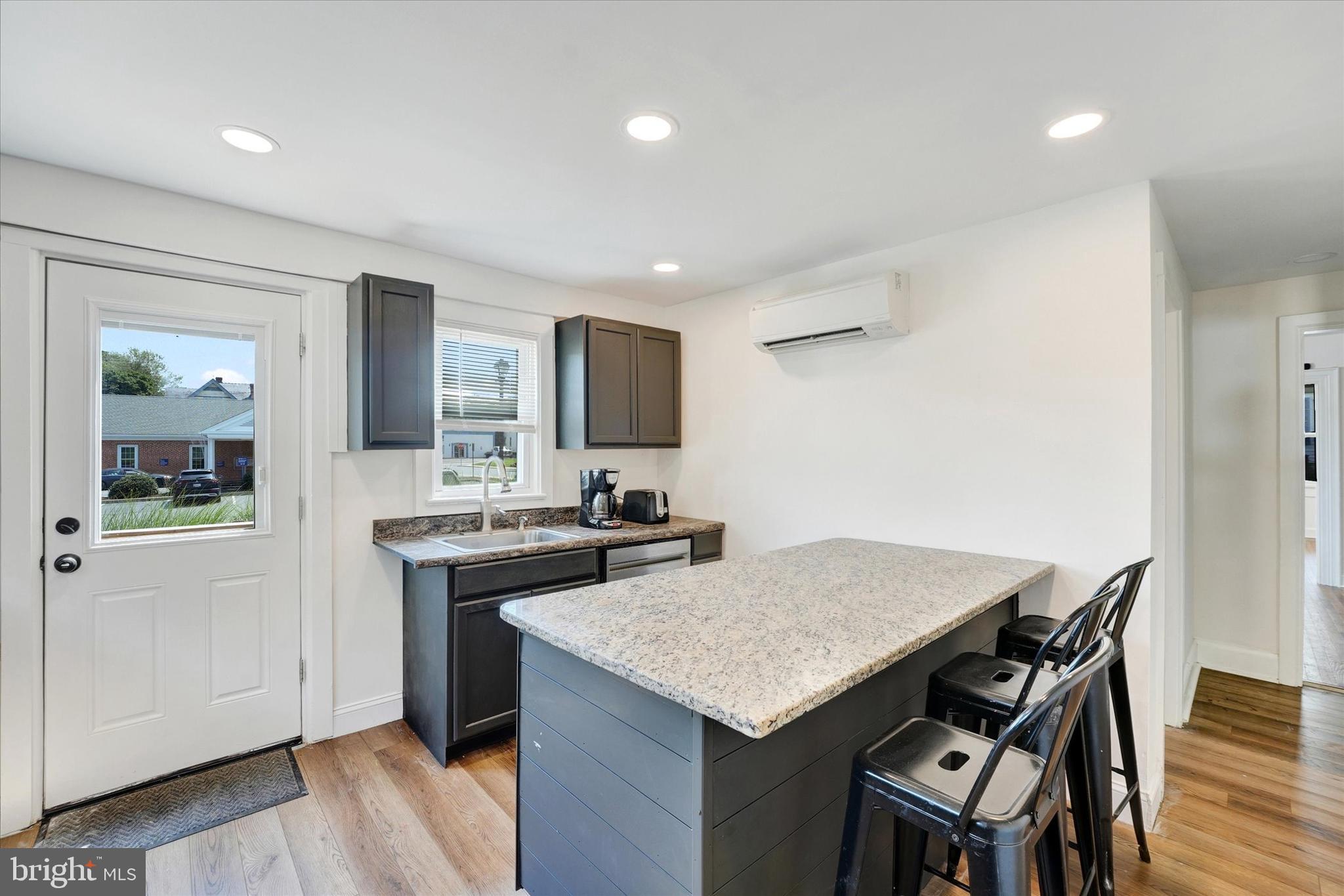 15 North Walnut Street Rising Sun, MD 21911 - Photo 16 of 43 a kitchen that has a table and chairs in it