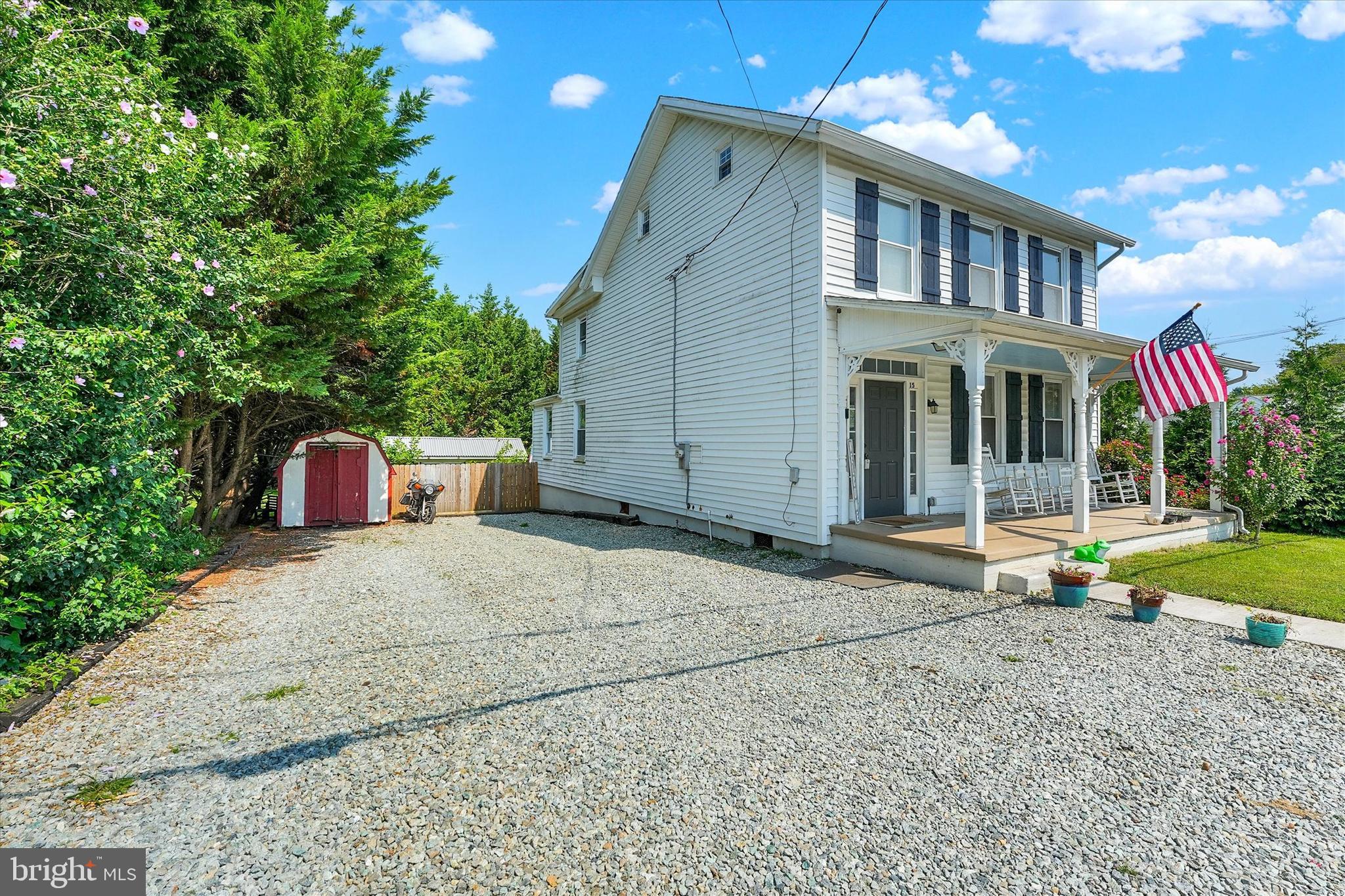 15 North Walnut Street Rising Sun, MD 21911 - Photo 2 of 43 a front view of a house with a yard and garage