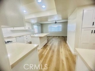 10801 Pine Street Los Alamitos, CA 90720 - Photo 11 of 24 a bathroom with a sink a mirror and a bathtub