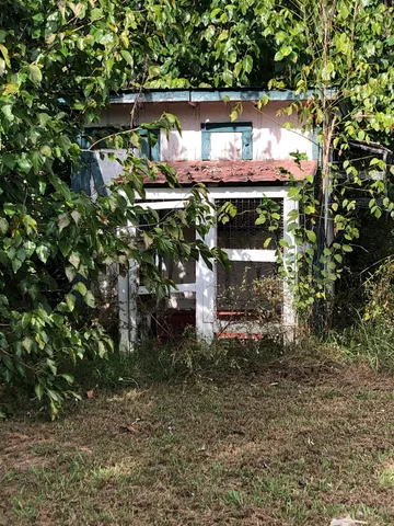 an outdoor view of house with outdoor space