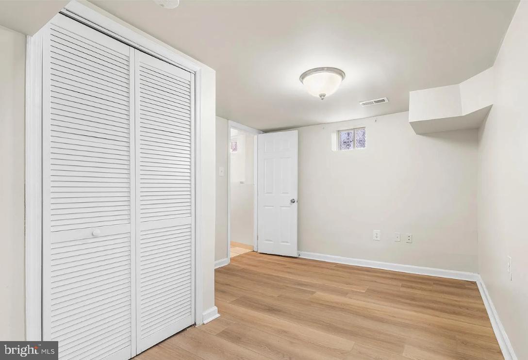 1401 Druid Hill Avenue, Unit A Baltimore, MD 21217 - Photo 13 of 17 a view of a livingroom with an empty space
