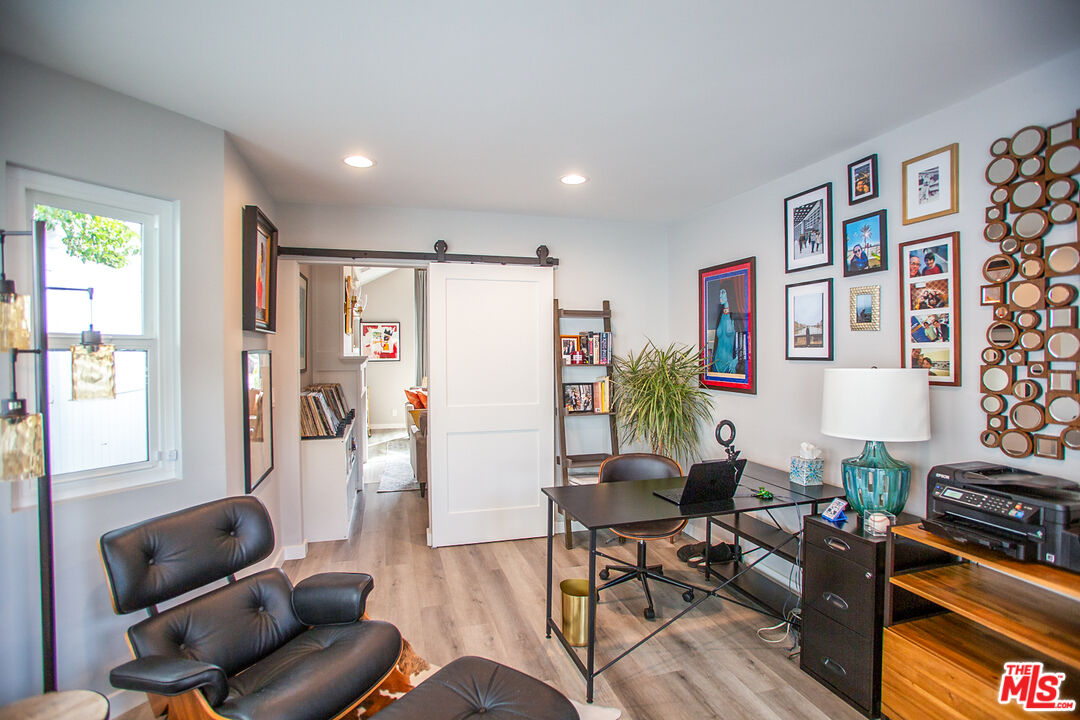 137 Main Street Los Alamos, CA 93440 - Photo 11 of 52 a living room with furniture a rug and a window