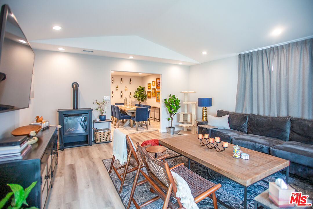 137 Main Street Los Alamos, CA 93440 - Photo 21 of 52 a living room with furniture and wooden floor