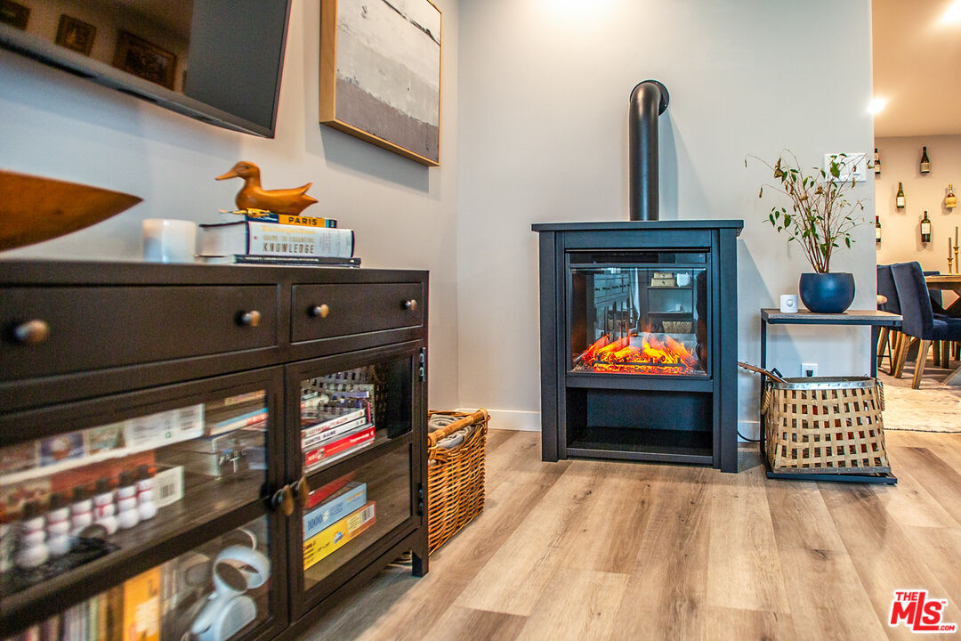 137 Main Street Los Alamos, CA 93440 - Photo 22 of 52 a living room with furniture and a flat screen tv