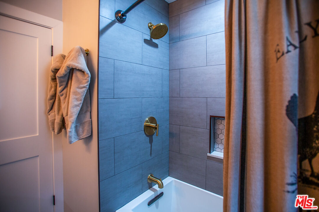 137 Main Street Los Alamos, CA 93440 - Photo 38 of 52 a bathroom with a shower