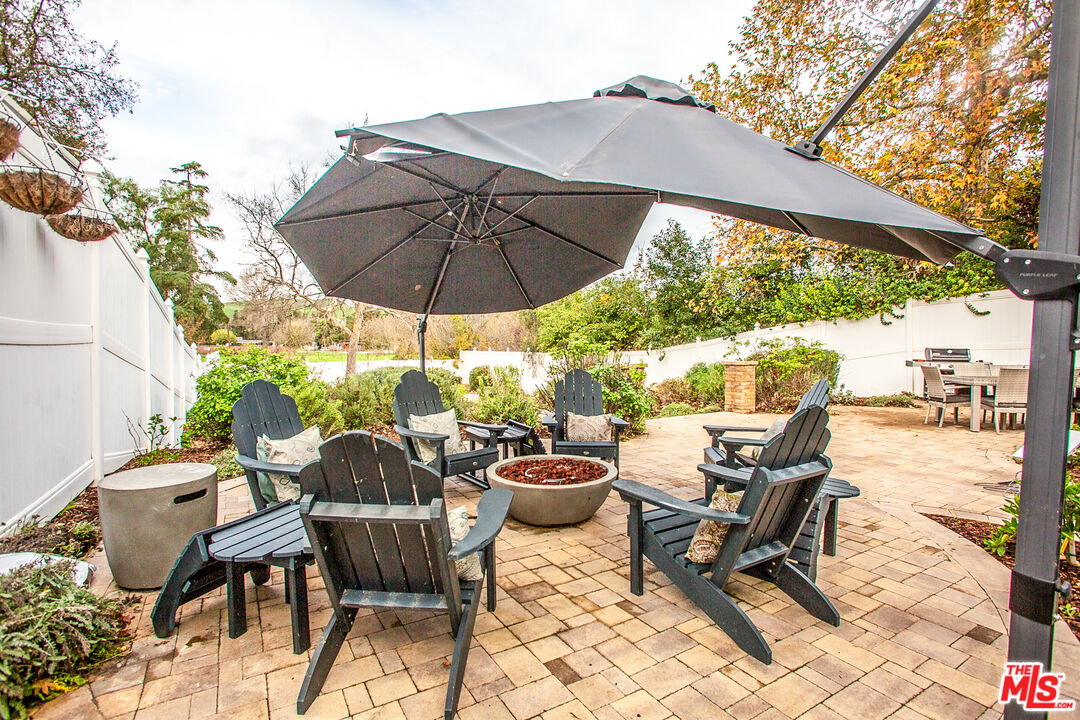 137 Main Street Los Alamos, CA 93440 - Photo 41 of 52 a view of an outdoor sitting area with furniture and backyard