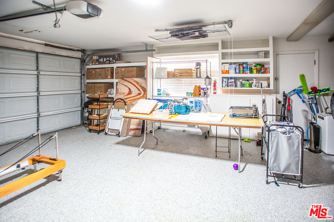 137 Main Street Los Alamos, CA 93440 - Photo 49 of 52 a room with gym equipment and a table