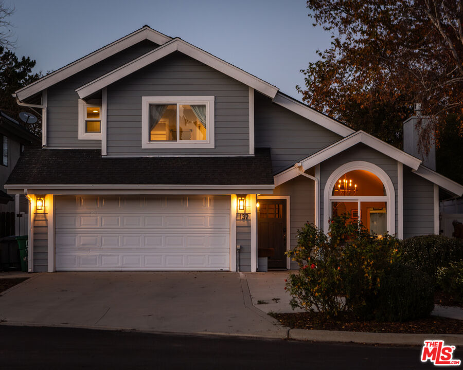 137 Main Street Los Alamos, CA 93440 - Photo 51 of 52 a front view of a house with garden