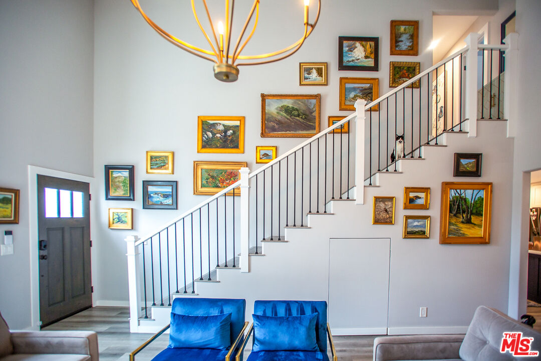 137 Main Street Los Alamos, CA 93440 - Photo 7 of 52 a view of entryway and hall with wooden floor