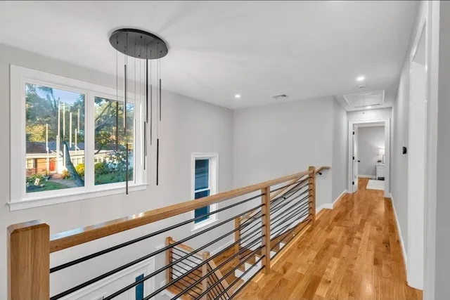 a view of a room with window and wooden floor