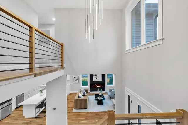 a view of livingroom with furniture and workspace