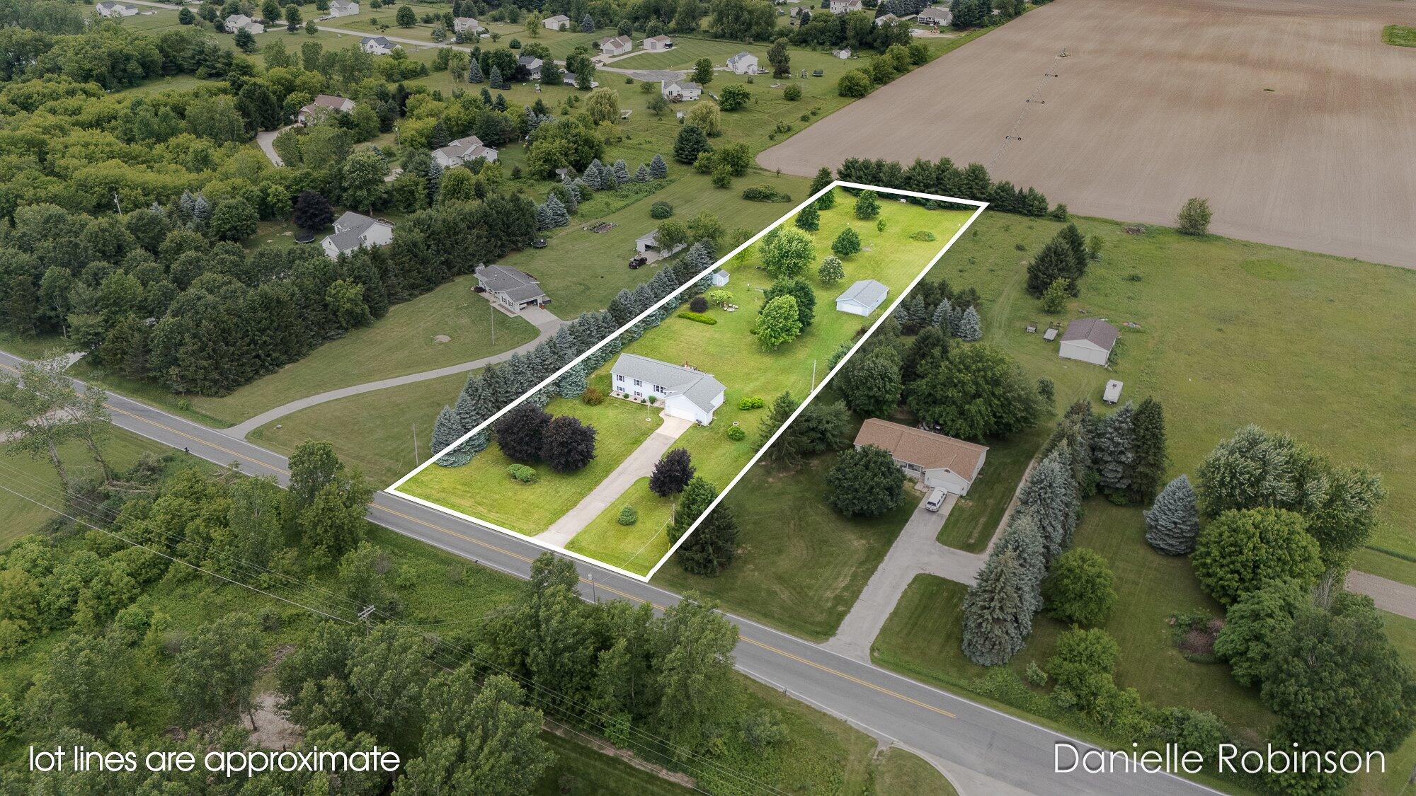6829 12 Mile Road Northeast Rockford, MI 49341 - Photo 3 of 70 03-WM682912mile-3