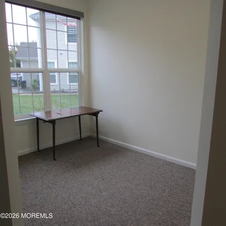a view of a room with a window