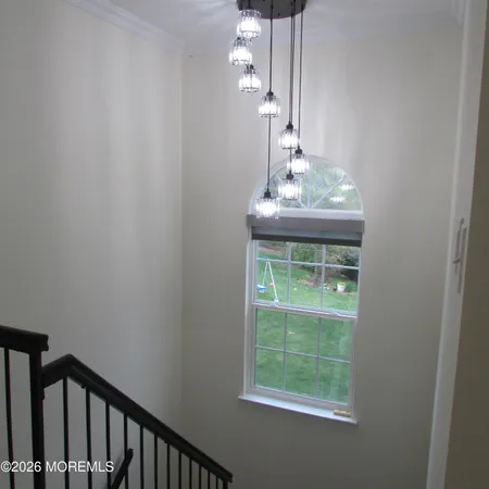 a view of entryway with stairs