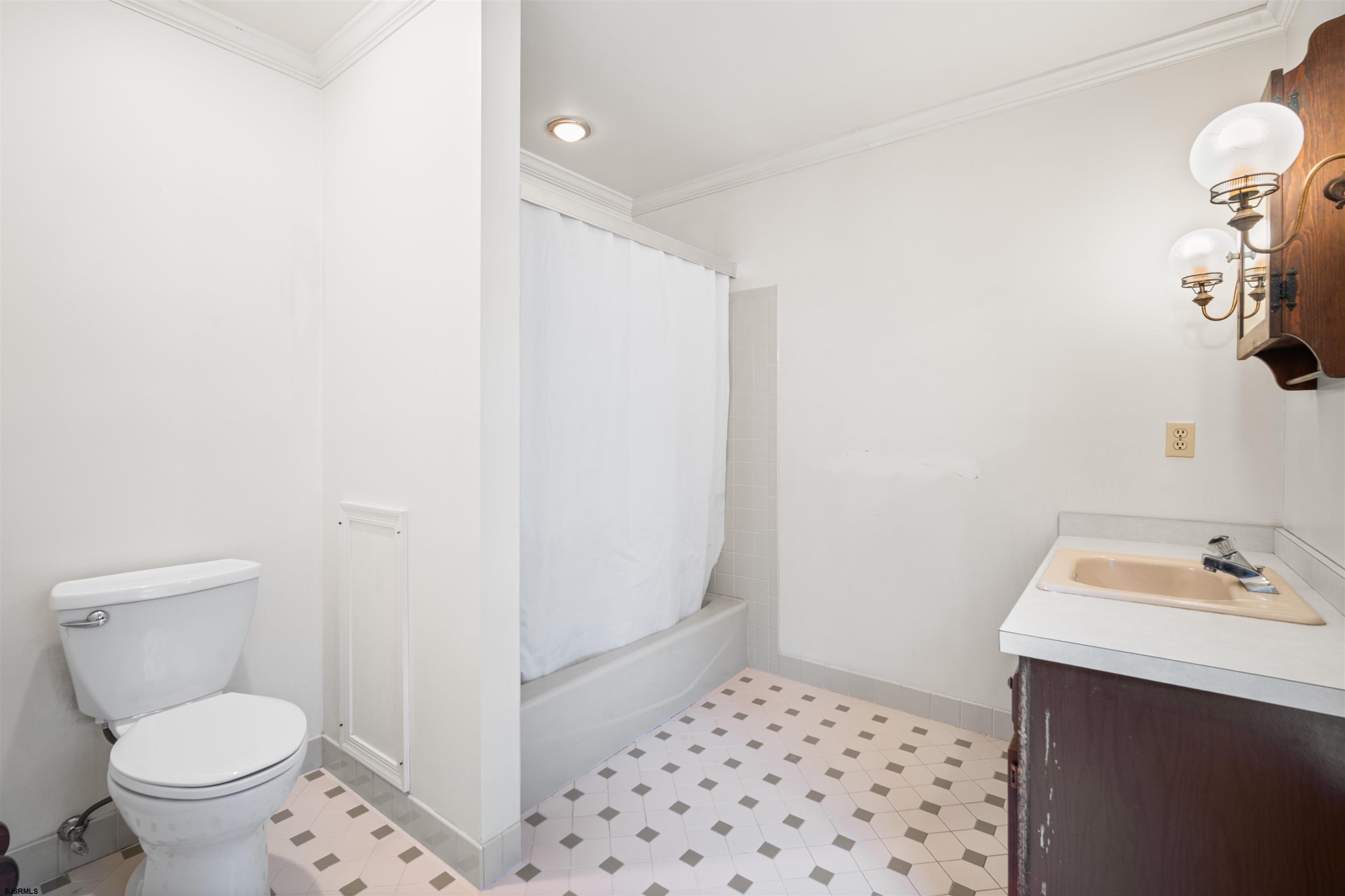 216 Riverside Drive Port Republic, NJ 08241 - Photo 24 of 47 a bathroom with a sink toilet and vanity