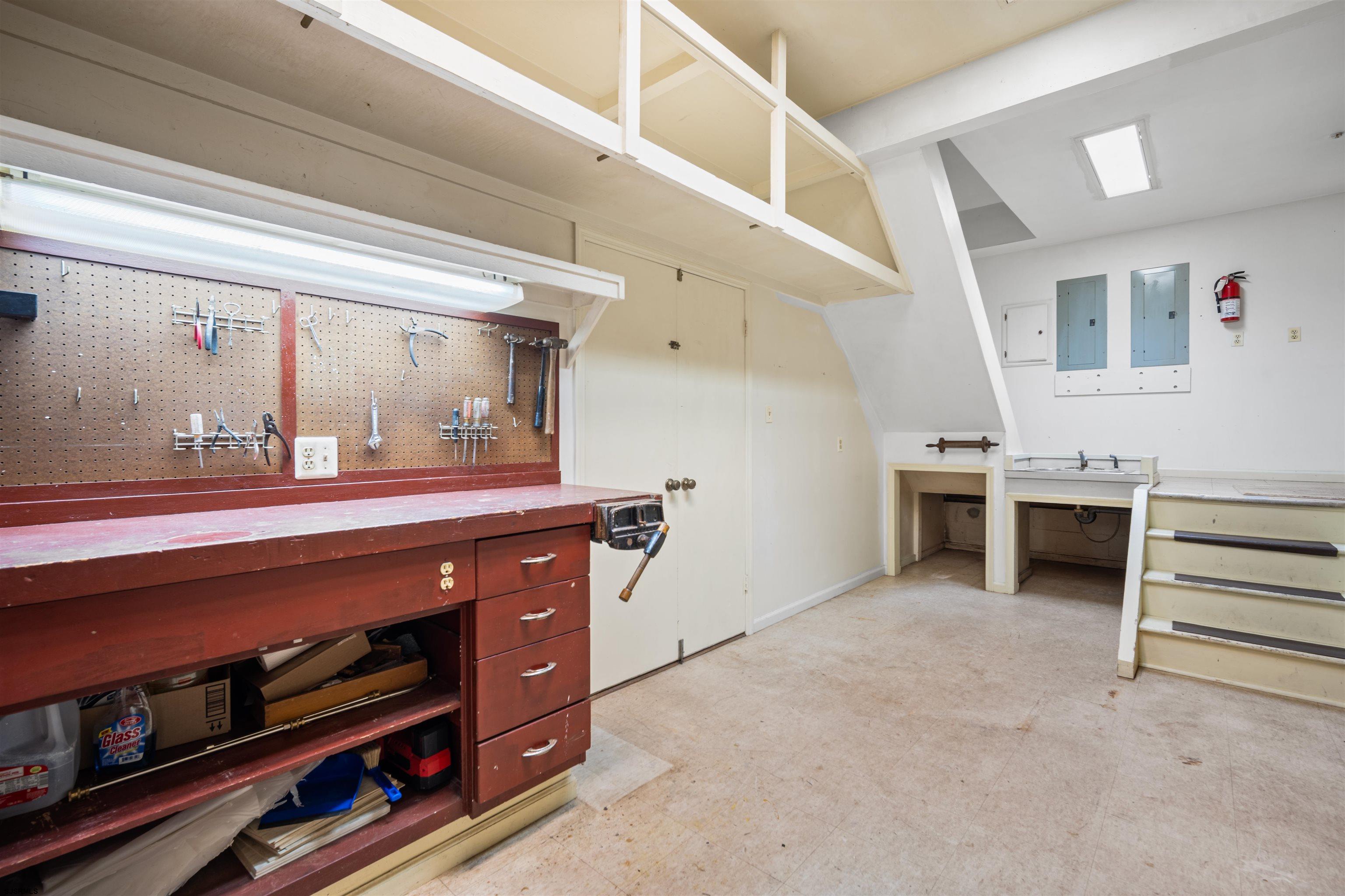 216 Riverside Drive Port Republic, NJ 08241 - Photo 29 of 47 a bathroom with a sink and a mirror