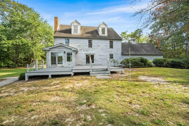 a front view of a house with swimming pool
